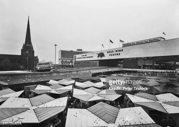 High angle view over the market stalls of the Bull Ring Open Market outside the Bull Ring Shopping Centre in Birmingham, West Midlands, England, 13th...