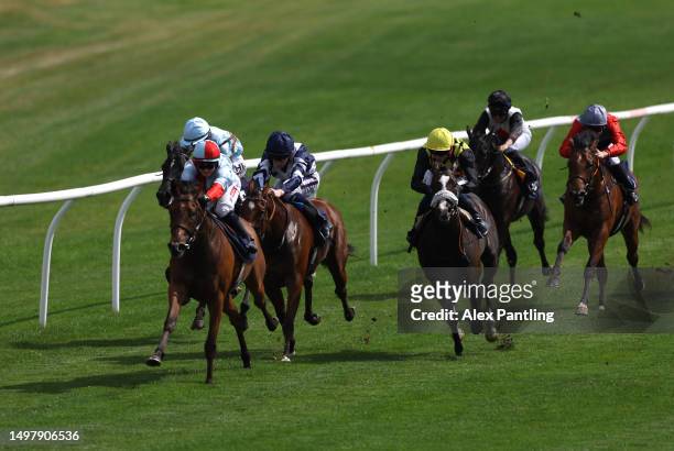 Hollie Doyle riding Grey Grey leads the way in The At The Races App Form Study Restricted Maiden Stakes at Lingfield Park on June 12, 2023 in...
