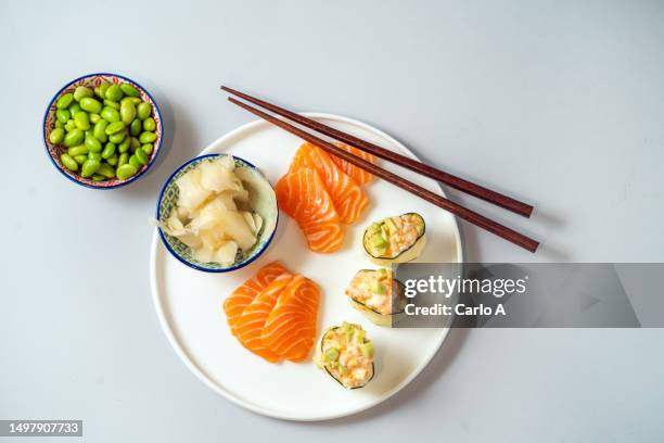 japanese food, salmon ,sashimi and avocado sushi - shrimp edamame stock pictures, royalty-free photos & images