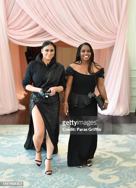 In this image released on June 10 Laura Govan and Dora Whittley arrive at the wedding of Pinky Cole and Derrick Hayes at St. Regis Atlanta on June...