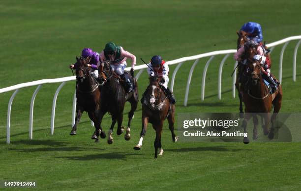 Jason Watson riding Kentucky Bluegrass leads the way in The Follow @attheraces On Twitter Restricted Novice Stakes at Lingfield Park on June 12, 2023...