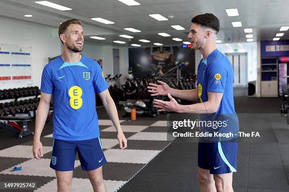 Jordan Rice Declan Declan Rice and Jordan Henderson of England talk in the gym at St ...