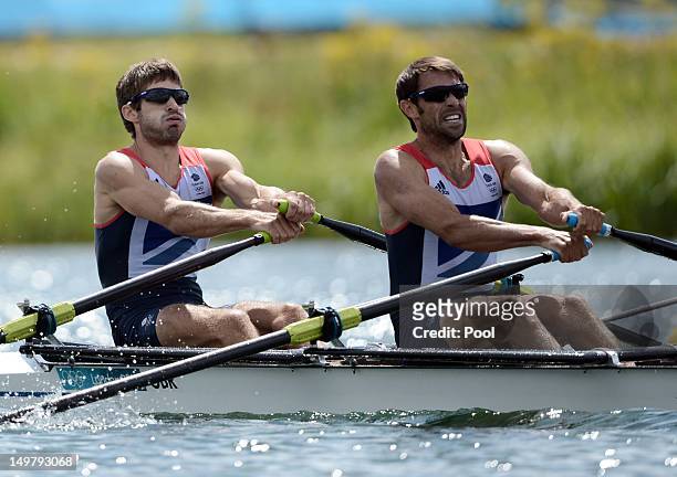 Mark Hunter and Zac Purchase of Great Britain compete on their way to winning the silver medal in the Lightweight Men's Double Sculls Final on Day 8...