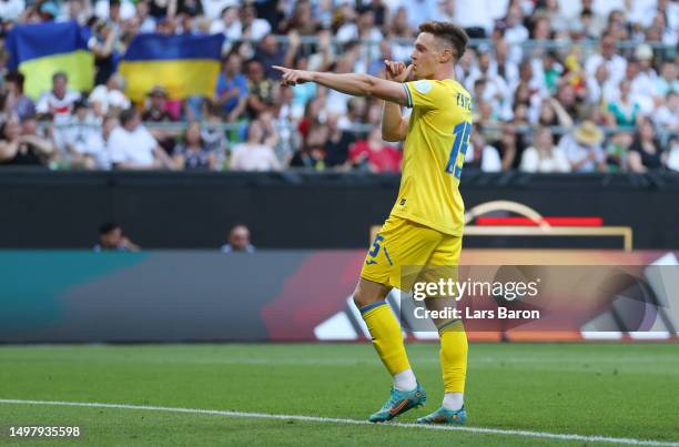 Viktor Tsygankov of Ukraine celebrates after scoring the team's third goal during the International Friendly match between Germany and Ukraine at...