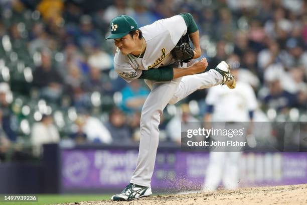 Shintaro Fujinami of the Oakland Athletics throws a pitch against the Milwaukee Brewers at American Family Field on June 11, 2023 in Milwaukee,...