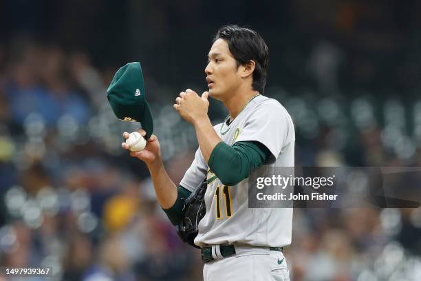 Shintaro Fujinami of the Oakland Athletics enters the game against the Milwaukee Brewers at American Family Field on June 11, 2023 in Milwaukee,...