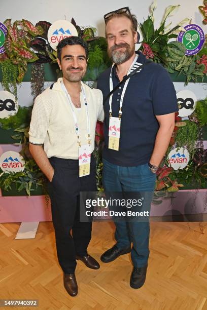 Deputy Global Editorial Director of GQ Magazine Adam Baidawi and David Harbour attend the GQ x evian private lunch at Wimbledon on July 4, 2023 in...