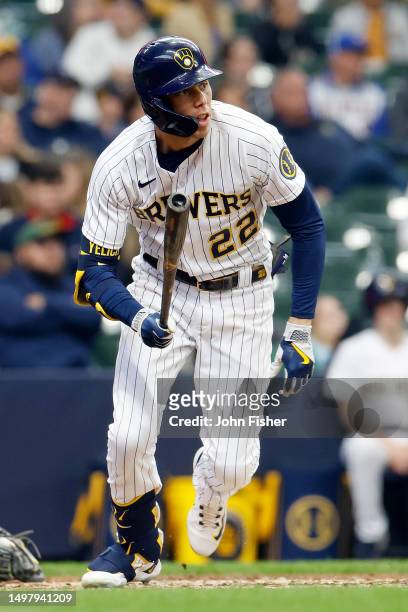 Christian Yelich of the Milwaukee Brewers hits a single against the Oakland Athletics at American Family Field on June 11, 2023 in Milwaukee,...