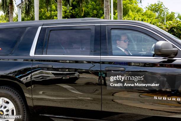 Republican presidential candidate former U.S. President Donald Trump arrives in his motorcade to Trump National Doral Miami resort on June 12, 2023...