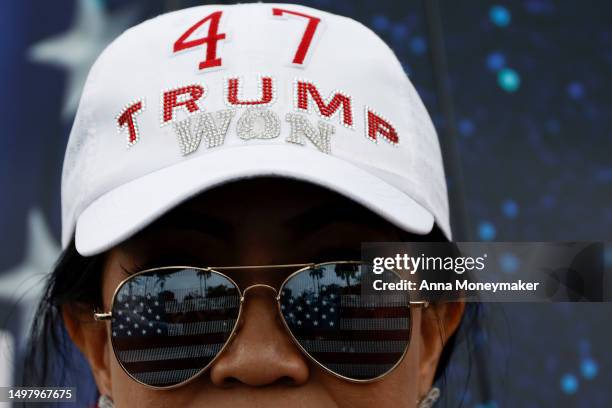 Supporters of former U.S. President Donald Trump protest outside of Trump National Doral resort as they await his arrival on June 12, 2023 in Doral,...