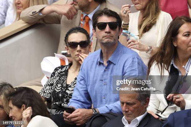 Laurie Delhostal and Pierre Rabadan attend the 2023 French Open at Roland Garros on June 11, 2023 in Paris, France.