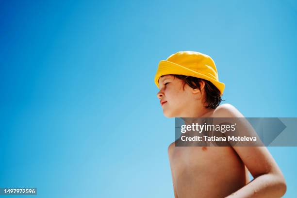 Bot Sunbaking 2,711 Boy Sunbathing Stock Photos, High-Res Pictures, and Images ...
