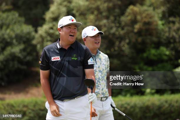Sungjae Im of South Korea and Si Woo Kim of South Korea look on from the fifth tee during a practice round prior to the 123rd U.S. Open Championship...