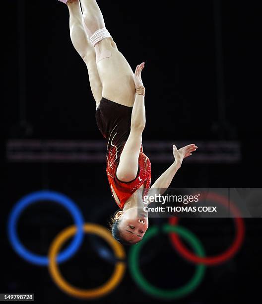 China's Wenna He competes in the women's trampoline final of the artistic gymnastics event of the London 2012 Olympic Games in London on August 4,...