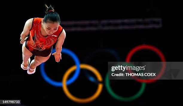 China's Wenna He competes in the women's trampoline final of the artistic gymnastics event of the London 2012 Olympic Games in London on August 4,...