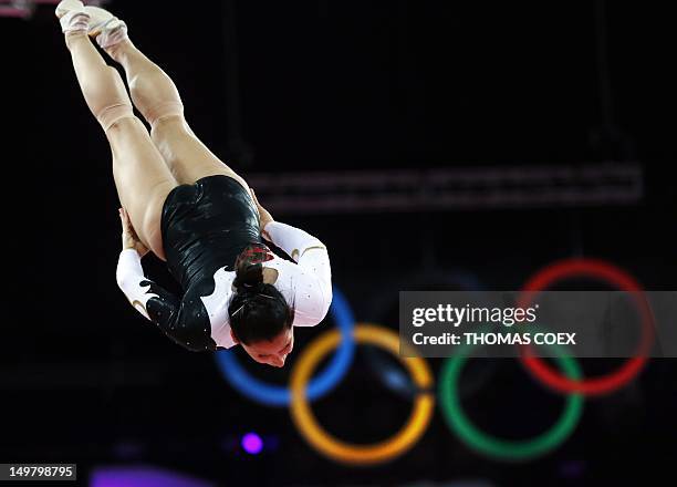 Germany's Anna Dogonnadze competes in the women's trampoline final of the artistic gymnastics event of the London 2012 Olympic Games in London on...