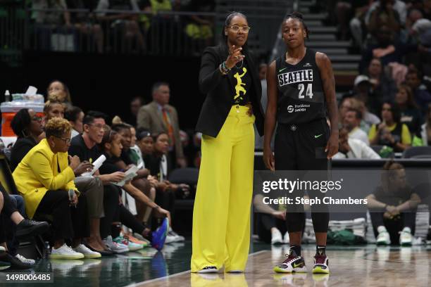 Head coach Noelle Quinn and Jewell Loyd of the Seattle Storm talk during the second quarter against the Washington Mystics at Climate Pledge Arena on...