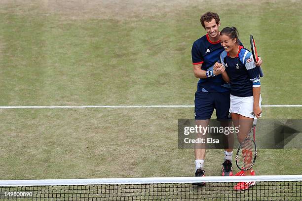 Laura Robson and Andy Murray of Great Britain celebrate after defeating Christopher Kas and Sabine Lisicki of Germany in their Mixed Doubles Tennis...