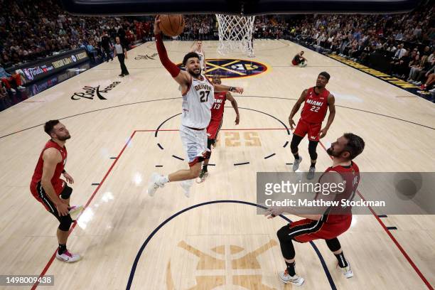 Jamal Murray of the Denver Nuggets drives to the basket during the first quarter against the Miami Heat in Game Five of the 2023 NBA Finals at Ball...