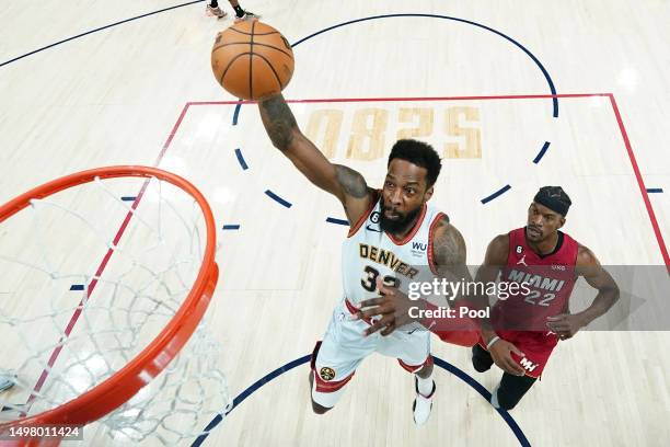 Jeff Green of the Denver Nuggets drives to the basket against Jimmy Butler of the Miami Heat during the first quarter in Game Five of the 2023 NBA...