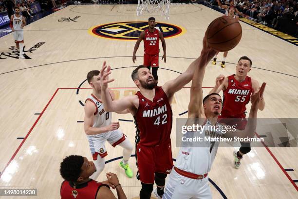 Michael Porter Jr. #1 of the Denver Nuggets battles Kevin Love of the Miami Heat during the first quarter in Game Five of the 2023 NBA Finals at Ball...