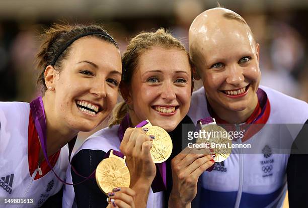 Dani King, Laura Trott, and Joanna Rowsell of Great Britain pose with their Gold medal in the medal ceremony for the Women's Team Pursuit Track...