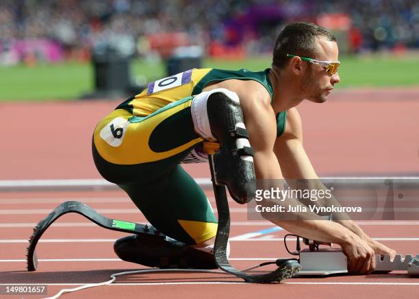 Oscar Pistorius of South Africa prepares for his race in the Men's 400m Round 1 heat on Day 8 of the 2012 London Olympic Games at the Olympic Stadium...