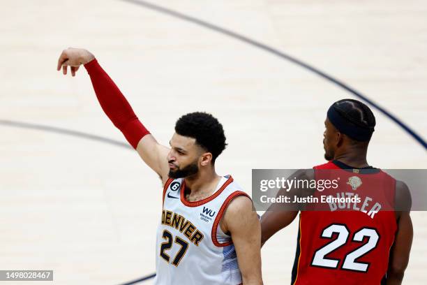 Jamal Murray of the Denver Nuggets reacts after a three point basket during the fourth quarter against the Miami Heat in Game Five of the 2023 NBA...