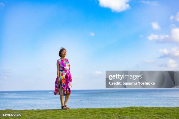 a woman staying at a resort inn on a southern island. - 鹿児島県 stockfoto's en -beelden