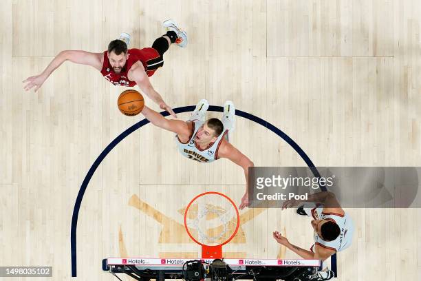 Nikola Jokic of the Denver Nuggets rebounds the ball in Game Five of the 2023 NBA Finals at Ball Arena on June 12, 2023 in Denver, Colorado. NOTE TO...