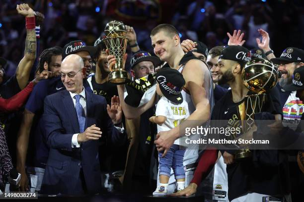 Nikola Jokic of the Denver Nuggets is presented the Bill Russell NBA Finals Most Valuable Player Award after a 94-89 victory against the Miami Heat...