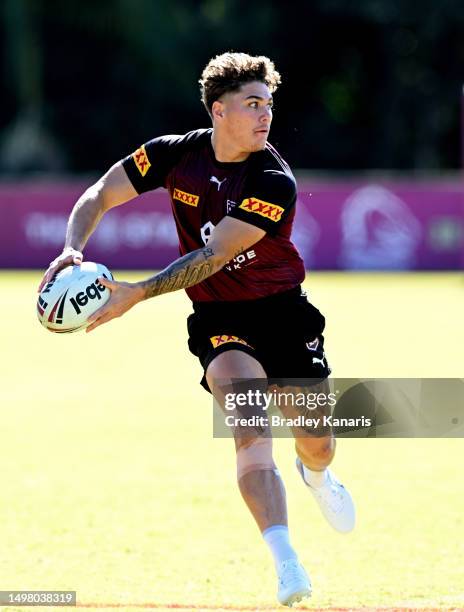 Reece Walsh looks to pass during a Queensland Maroons State of Origin training session at the Clive Berghofer Centre on June 13, 2023 in Brisbane,...