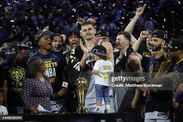 Nikola Jokic of the Denver Nuggets is presented the Bill Russell NBA Finals Most Valuable Player Award after a 94-89 victory against the Miami Heat...