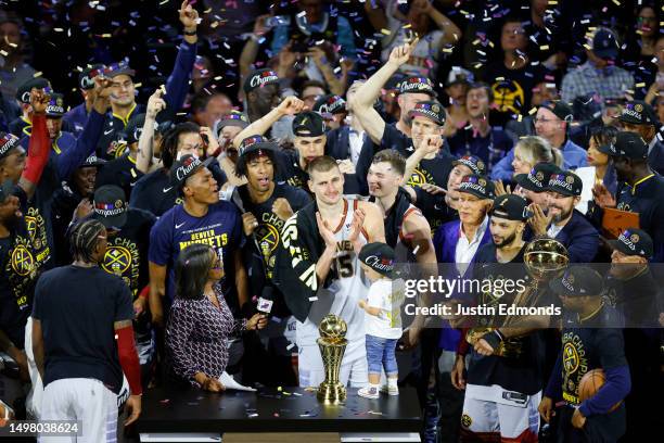 Nikola Jokic of the Denver Nuggets is presented the Bill Russell NBA Finals Most Valuable Player Award after a 94-89 victory against the Miami Heat...