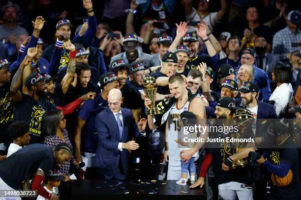 Nikola Jokic of the Denver Nuggets is presented the Bill Russell NBA Finals Most Valuable Player Award after a 94-89 victory against the Miami Heat...