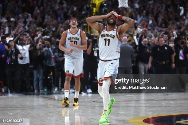 Bruce Brown and Aaron Gordon of the Denver Nuggets celebrate after a 94-89 victory against the Miami Heat in Game Five of the 2023 NBA Finals at Ball...