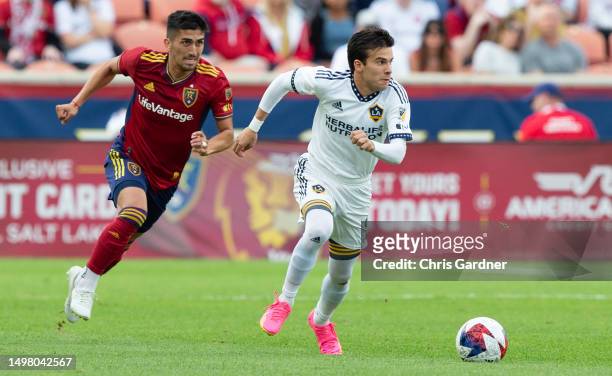 Riqui Puig of the Los Angeles Galaxy pushes the ball away from Pablo Ruiz of Real Salt Lake during the first half of the quarterfinals of the 2023...
