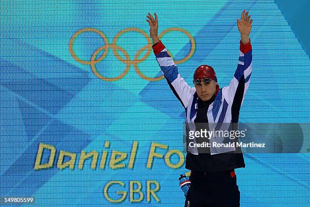 Daniel Fogg of Great Britain walks out ahead of the start of the Men's 1500m Freestyle Final on Day 8 of the London 2012 Olympic Games at the...