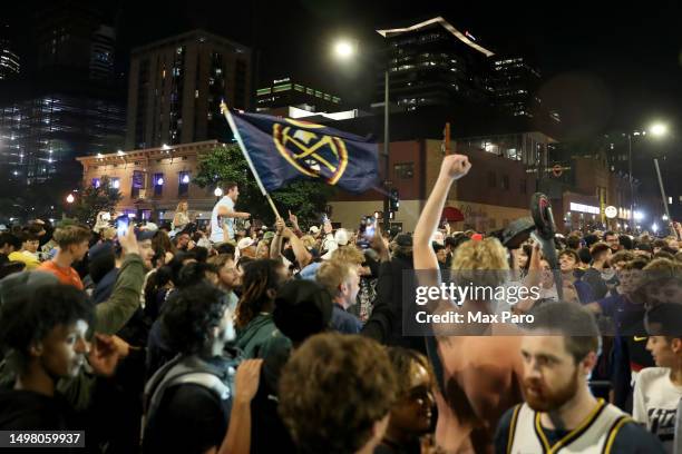 Denver Nuggets fans celebrate in downtown Denver after the end of Game Five of the 2023 NBA Finals at Ball Arena on June 12, 2023 in Denver,...