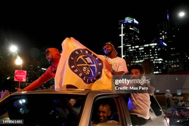 Denver Nuggets fans celebrate in downtown Denver after the end of Game Five of the 2023 NBA Finals at Ball Arena on June 12, 2023 in Denver,...