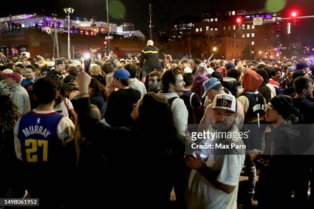 Denver Nuggets fans celebrate in downtown Denver after the end of Game Five of the 2023 NBA Finals at Ball Arena on June 12, 2023 in Denver,...