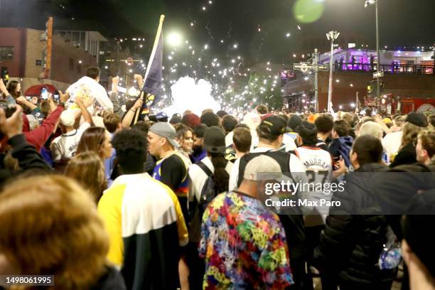 Denver Nuggets fans celebrate in downtown Denver after the end of Game Five of the 2023 NBA Finals at Ball Arena on June 12, 2023 in Denver,...