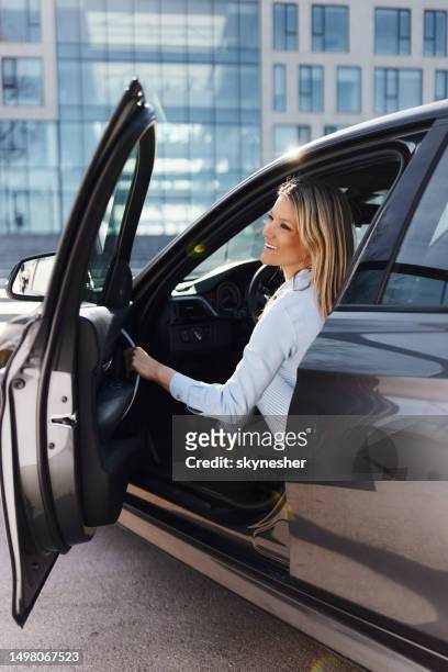 getting out of the car! - car leaving stock pictures, royalty-free photos & images