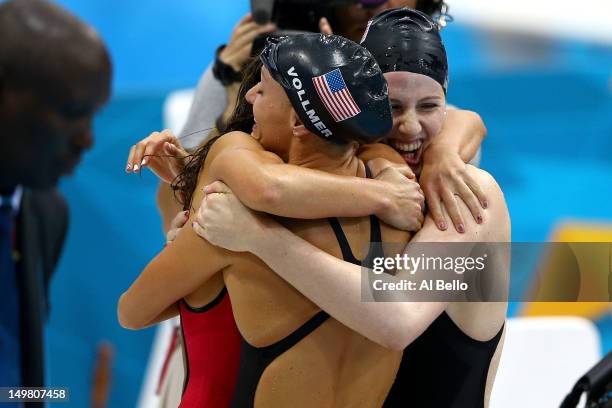 Dana Vollmer, Missy Franklin, and Rebecca Soni of the United States celebrate winning the Women's 4x100m Medley Relay on Day 8 of the London 2012...