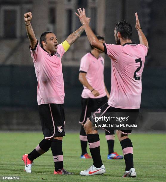 Fabrizio Miccoli of Palermo celebrates with team-mates after scoring the opening goal during the pre-season friendly match between US Citta di...