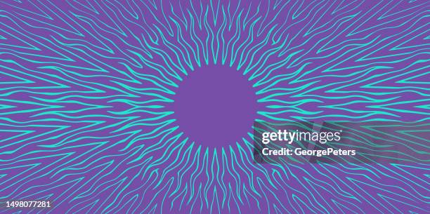 fiery sun with flame sunbeams - solar simulator stock illustrations