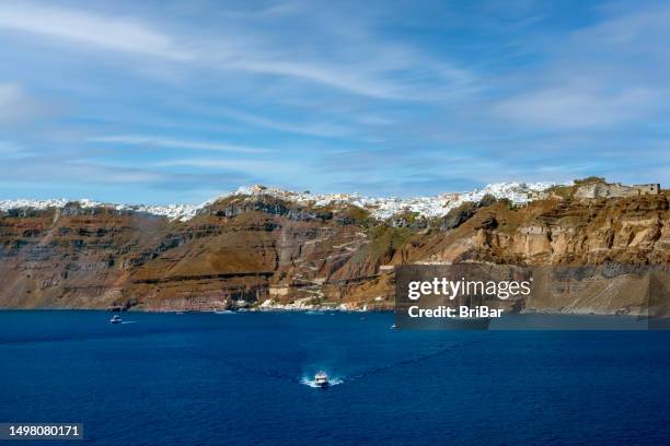 santorini island, greece with caldera and aegean sea - fira santorini stock pictures, royalty-free photos & images