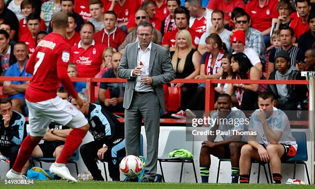 Manager Paul Lambert of Aston Villa watches on during the pre-season friendly match between Nottingham Forest and Aston Villa at the City Ground on...