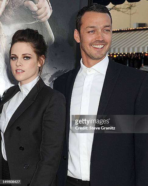 Kristen Stewart and Rupert Sanders arrives at the "Snow White And The Huntsman at Westwood Village on May 29, 2012 in Los Angeles, California.