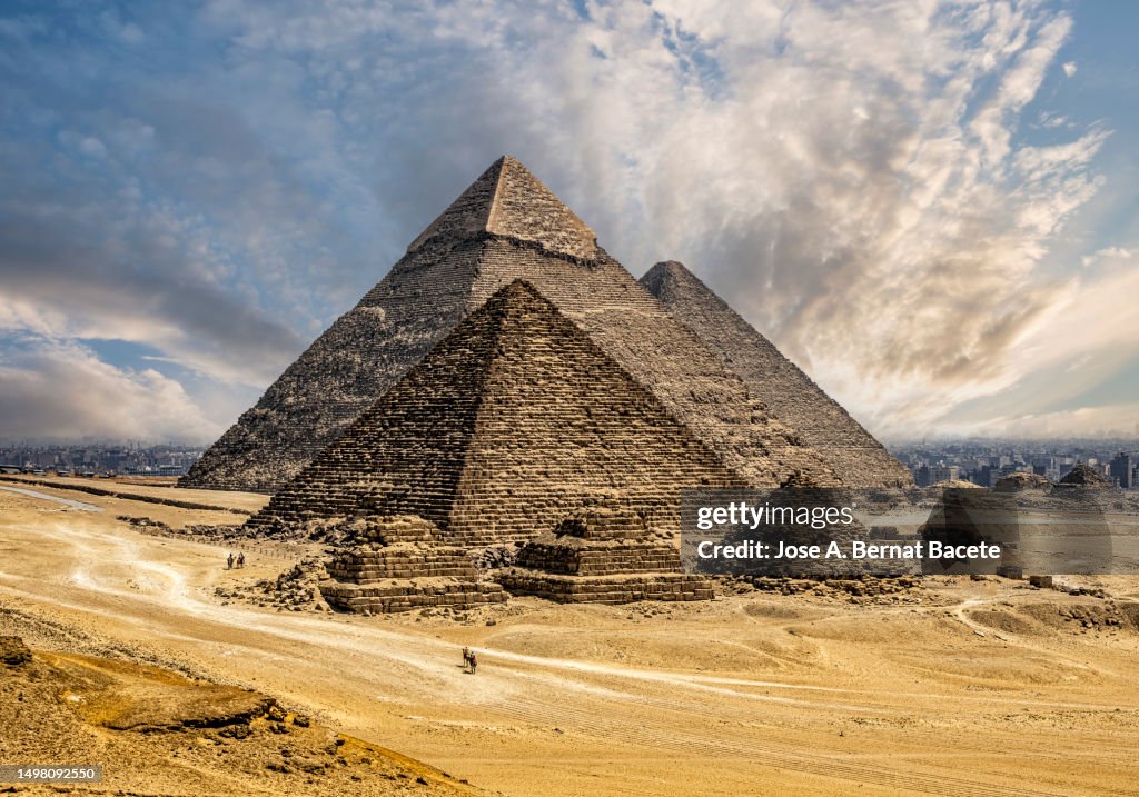 2 Pyramids Sunset Landscape Of The Giza Pyramids With Two Camels At Sunset Egypt High-Res ...